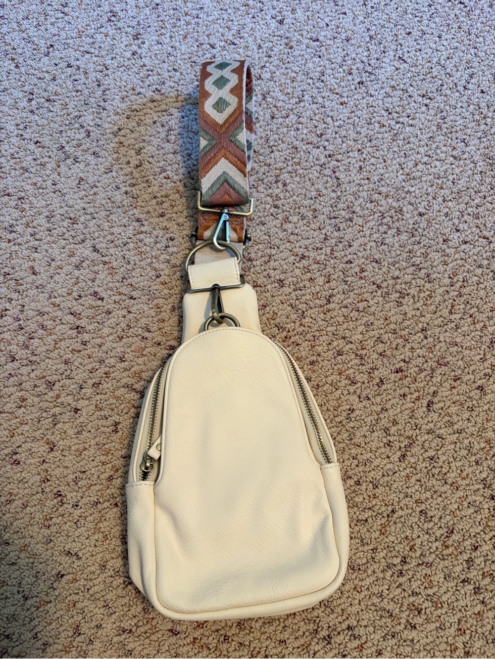 Anthropologie Cream Leather Sling Backpack with Patterned Strap